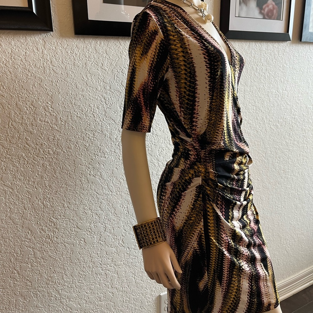 Jennifer Lopez dress great for a formal event or the office.